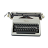 Machine à écrire Olympia dans sa valise