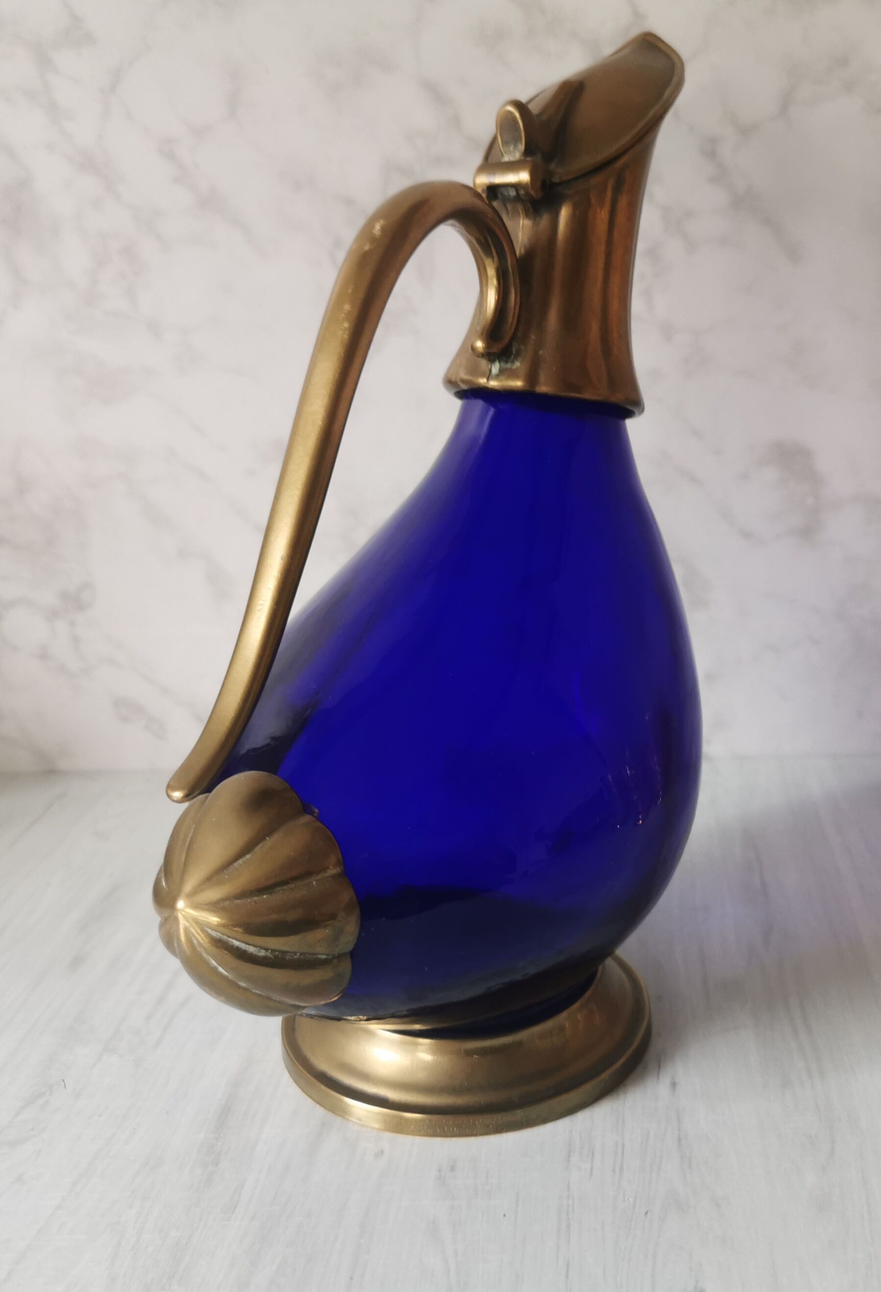 Glass and brass decanter