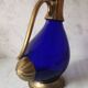Glass and brass decanter