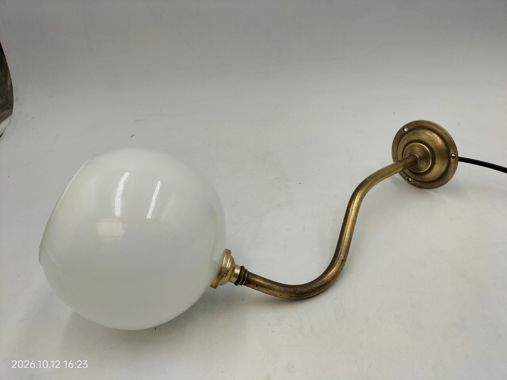 Brass and glass wall light