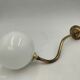 Brass and glass wall light