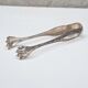 Solid silver sugar or ice tongs with lion's paw decoration