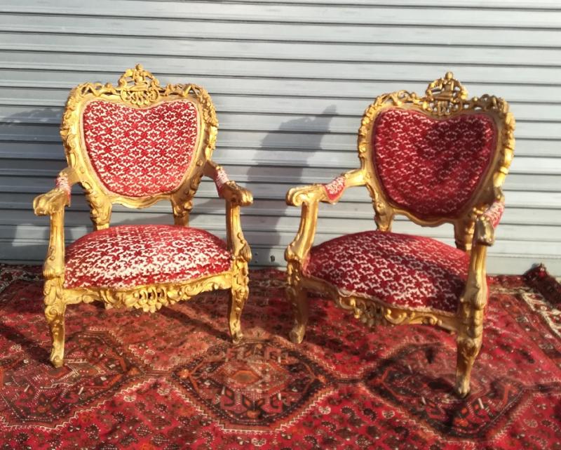 pair of gilded wooden ceremonial chairs