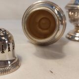 Set of two silver metal sprinklers