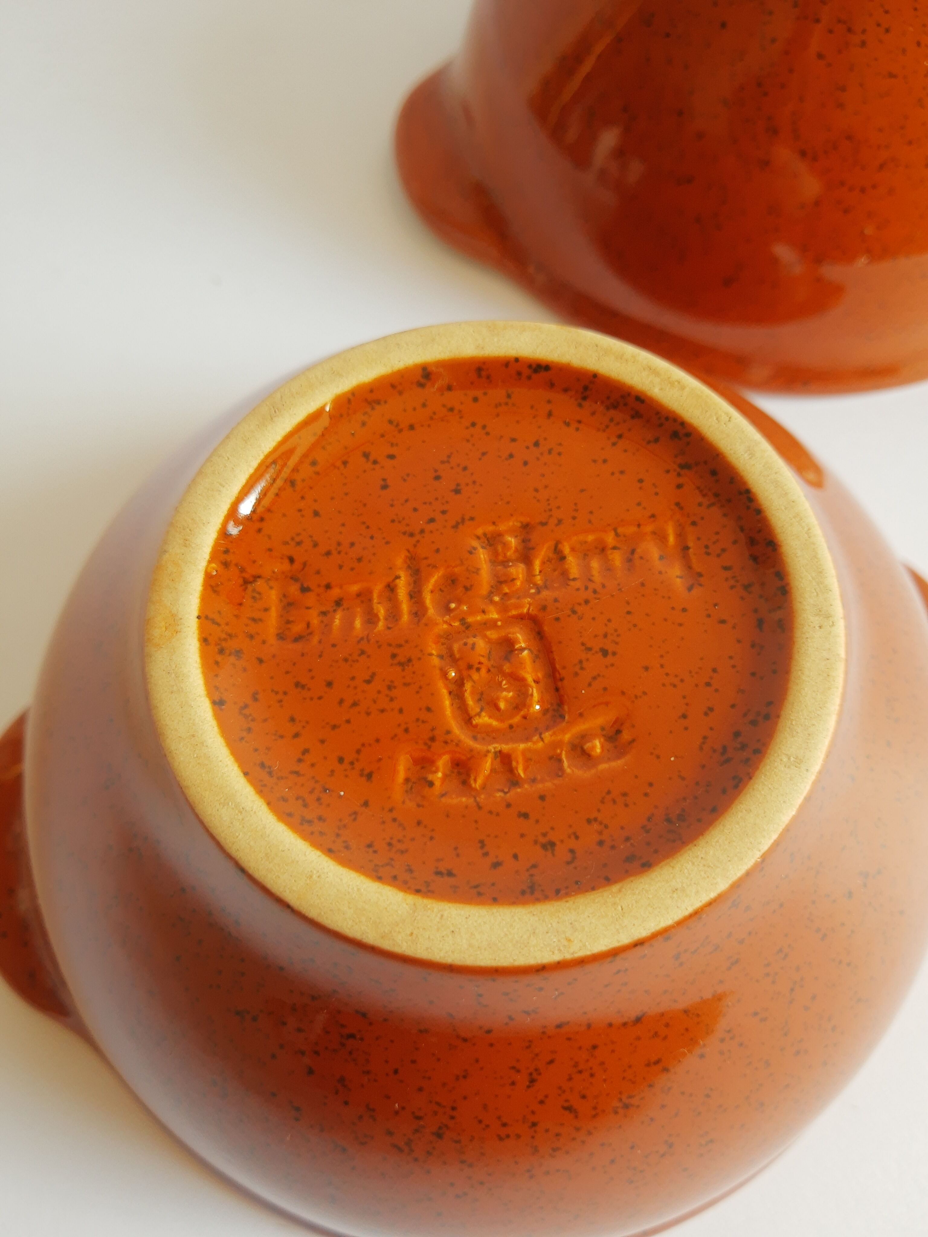 Duo of vintage Emile Henry cognac ear bowls