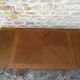 Oak table has two vintage extensions