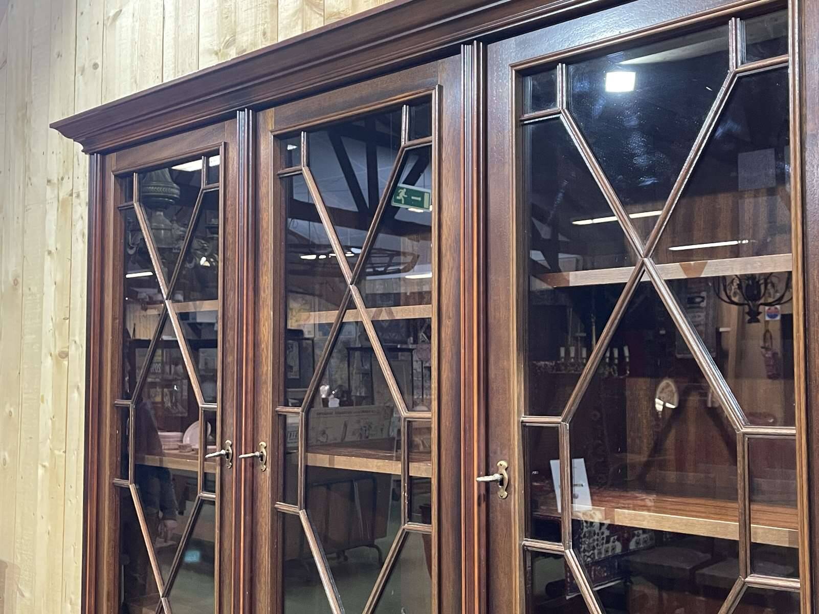 English two-piece mahogany bookcase, made in the 1970s