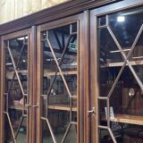 English two-piece mahogany bookcase, made in the 1970s