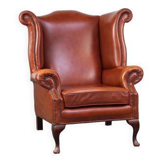 Fauteuil à oreilles Chesterfield anglais élégant, lisse et confortable dans une belle couleur classique