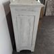 Small buffet with two doors and one drawer in white patinated wood.