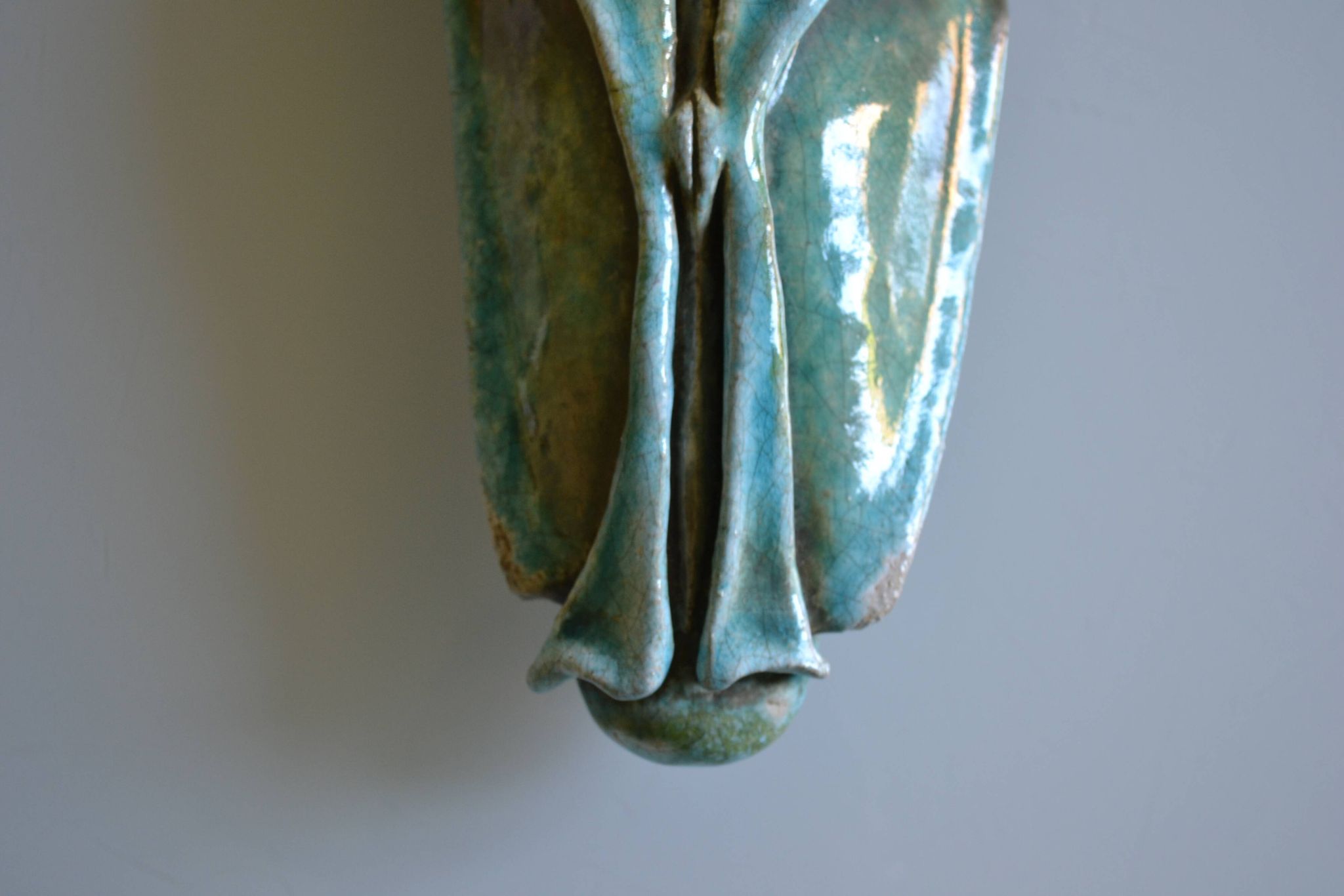Surreal ceramic sculpture in relief signed to be identified.
