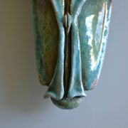 Surreal ceramic sculpture in relief signed to be identified.