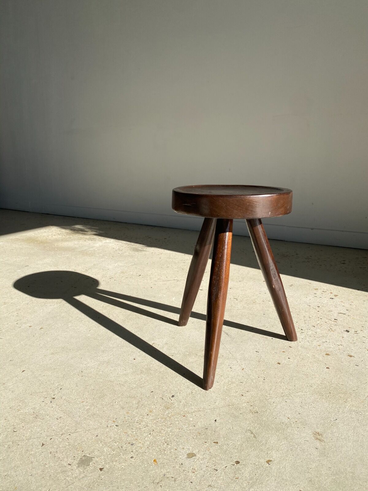 Brown solid wood stool seated circular dug