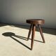 Brown solid wood stool seated circular dug