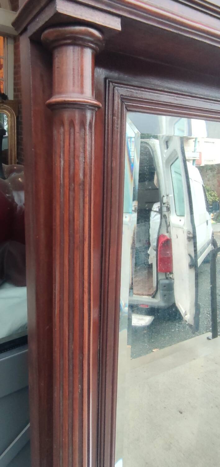 Old large carved wooden mirror