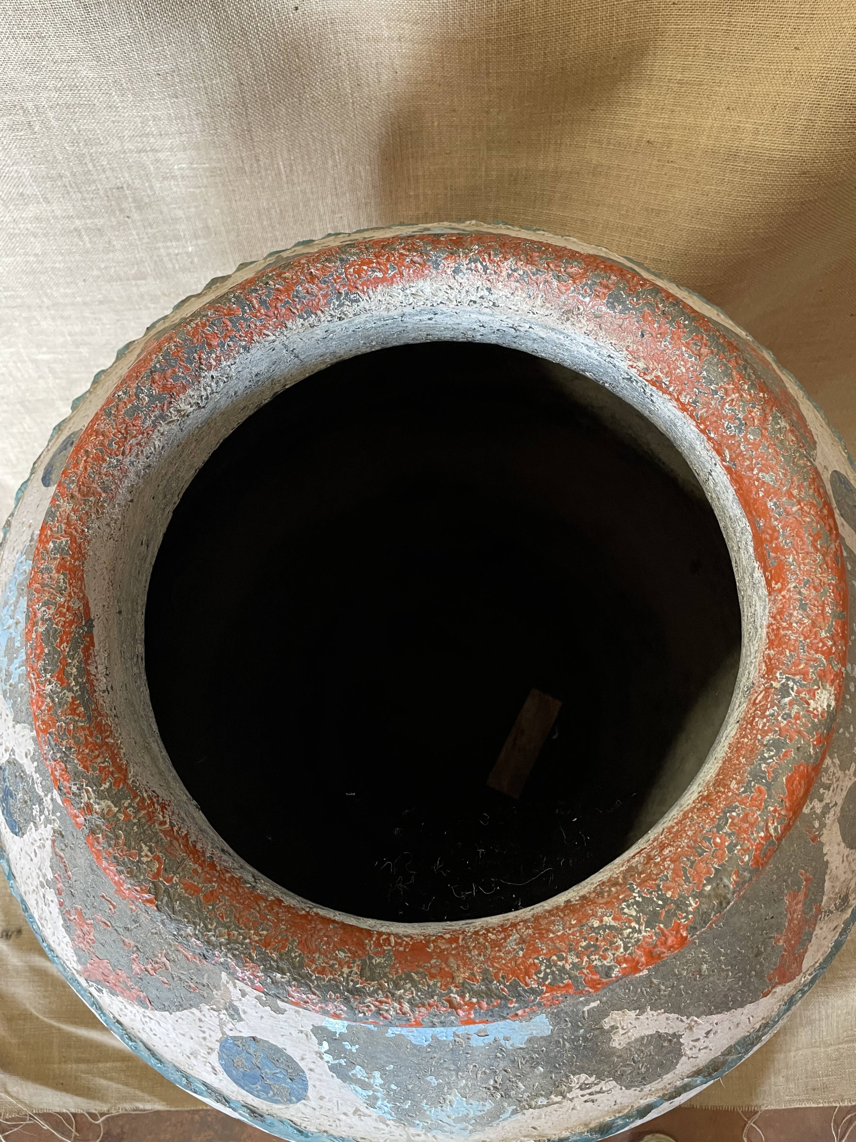 Polychrome decorated terracotta jar