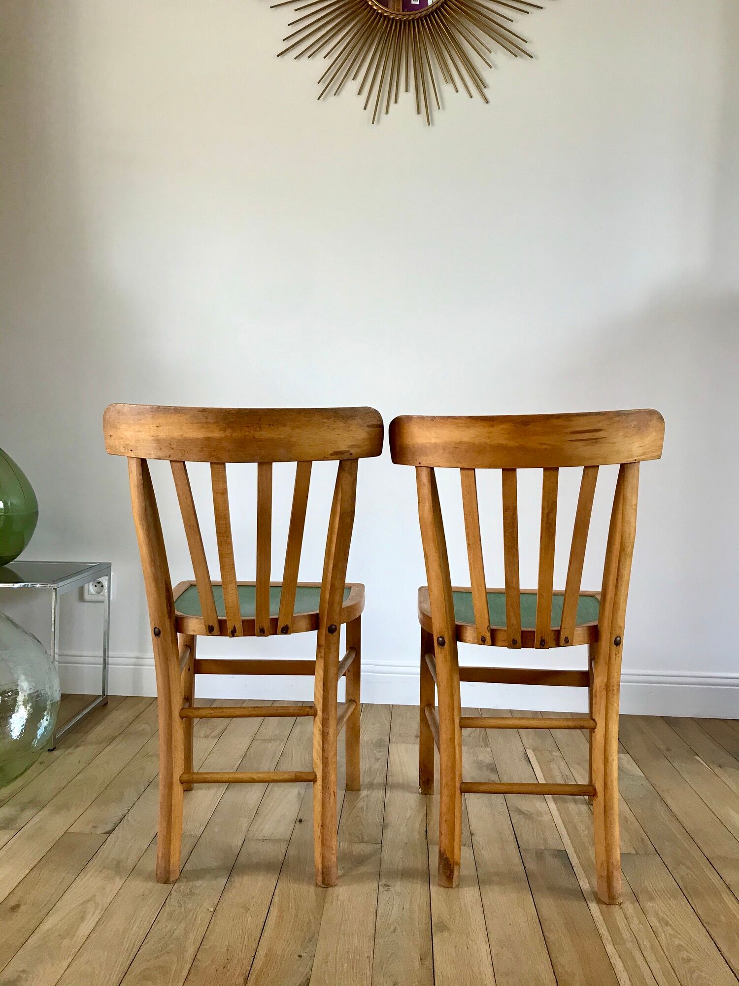 Pair of bistro chairs in light curved wood and green seat 1950s