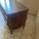 Curved commode with three drawers in light wood, Louis XV style.
