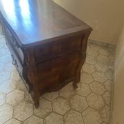 Curved commode with three drawers in light wood, Louis XV style.