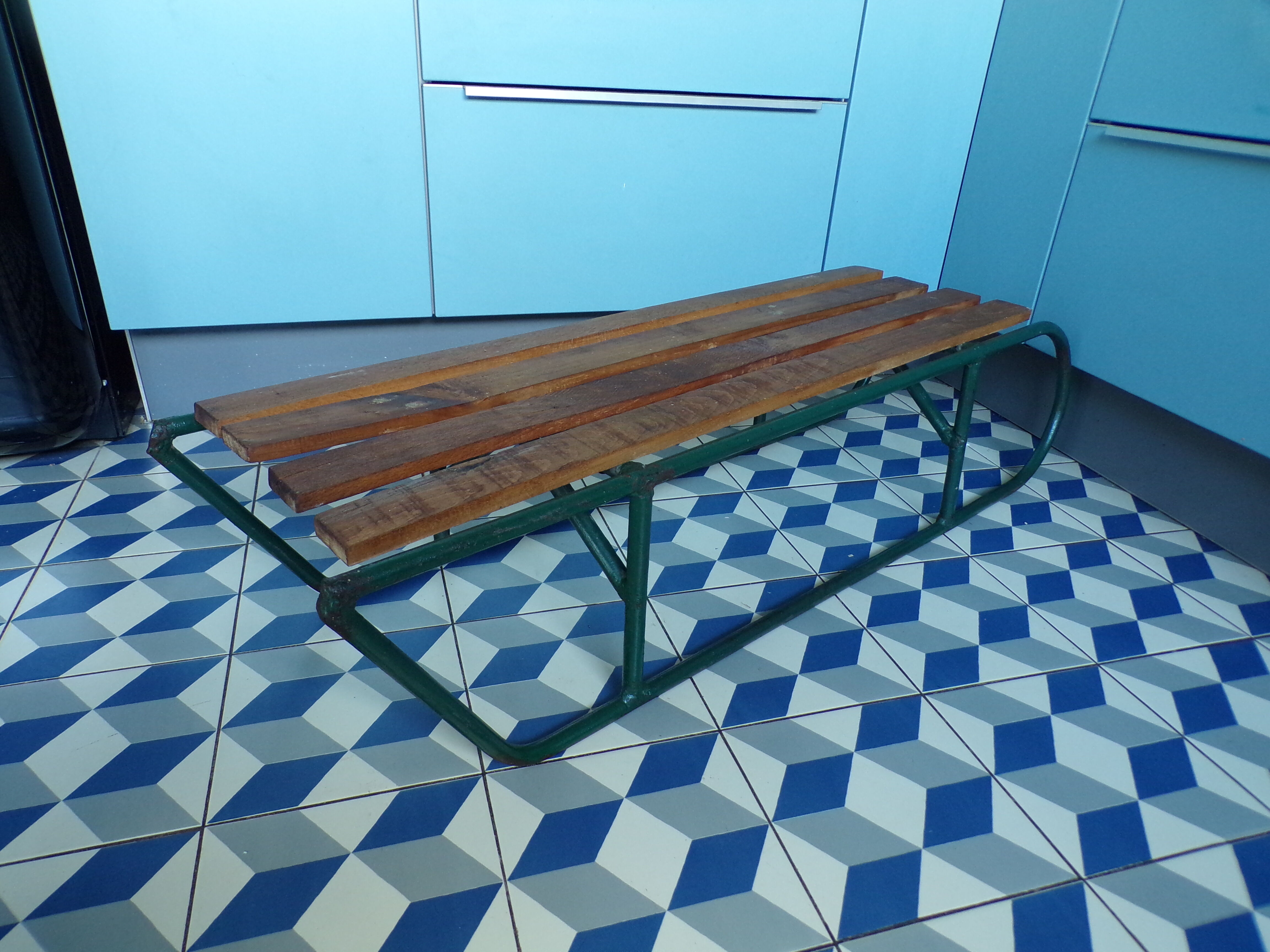 Old sledding iron and wood