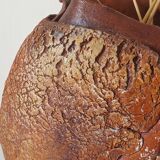 Signed textured terracotta vase