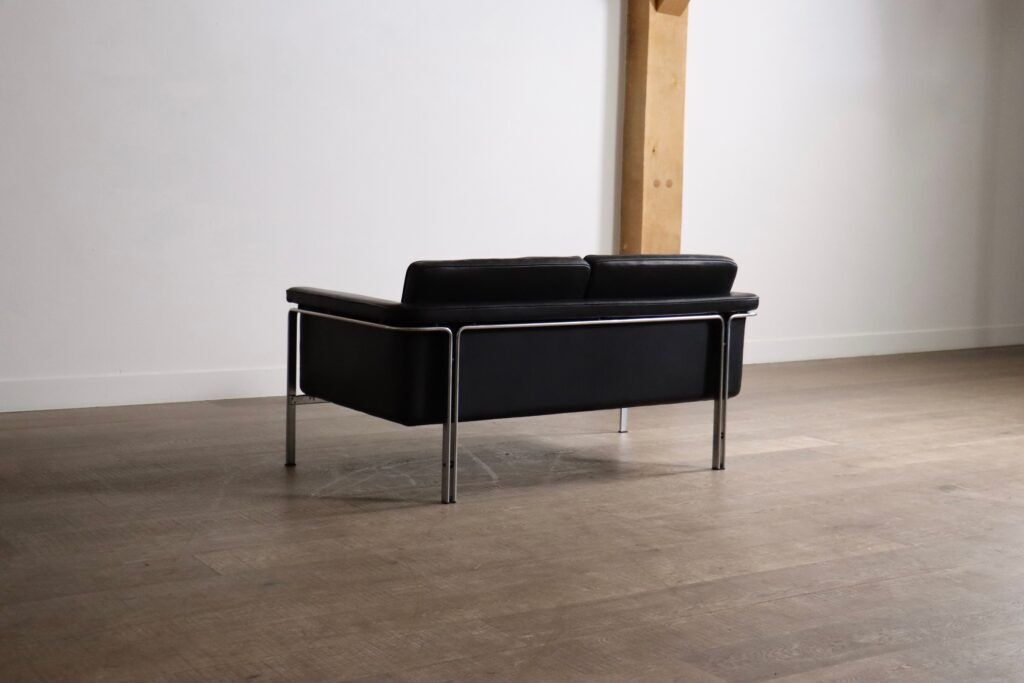Horst Brüning Model 6912 two seater sofa in black leather for Kill International, Germany 1967
