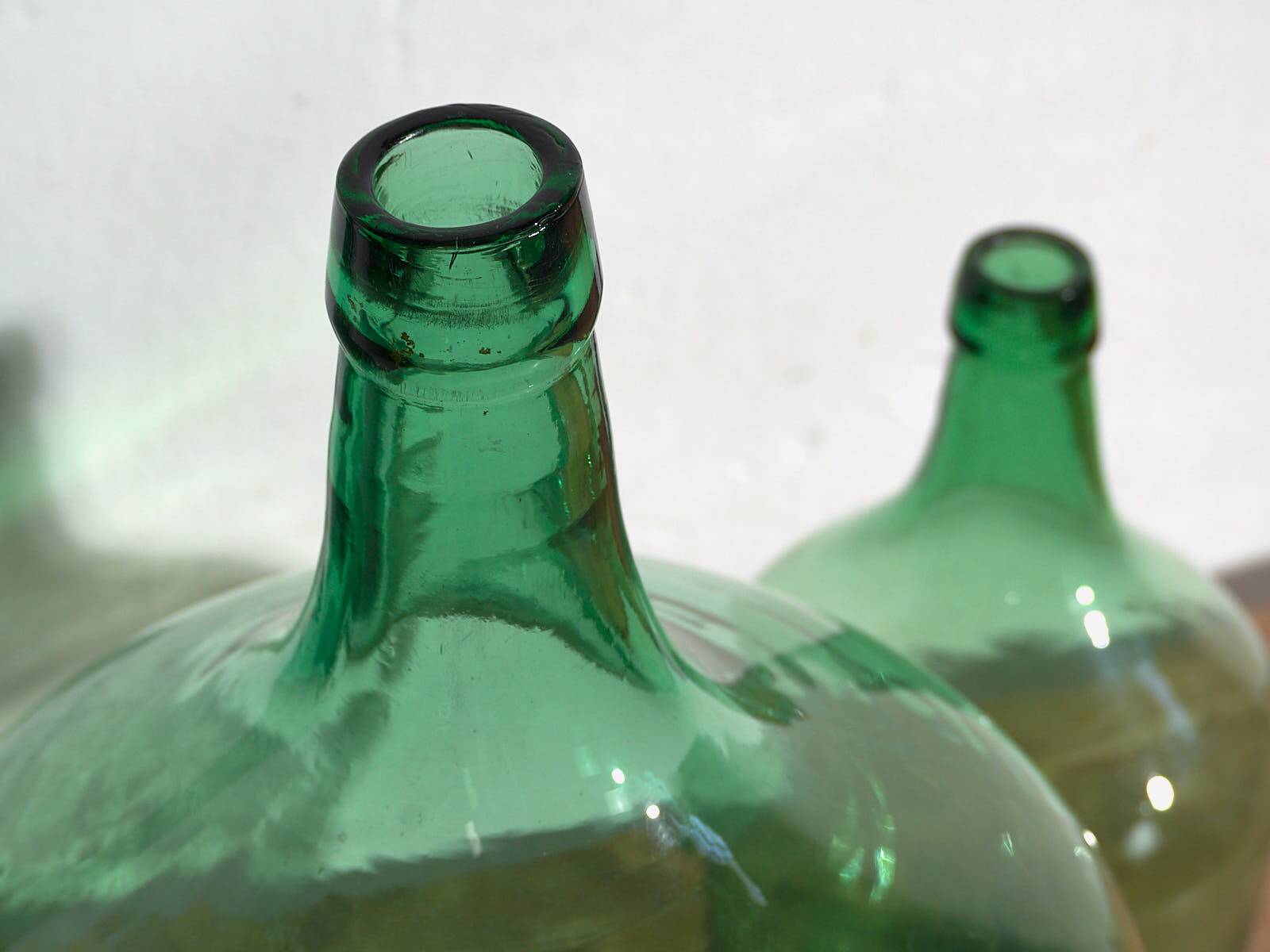 Antique green demijohns (c.1920). 3-piece set #6