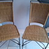 Pair of vintage wrought iron and rattan chairs