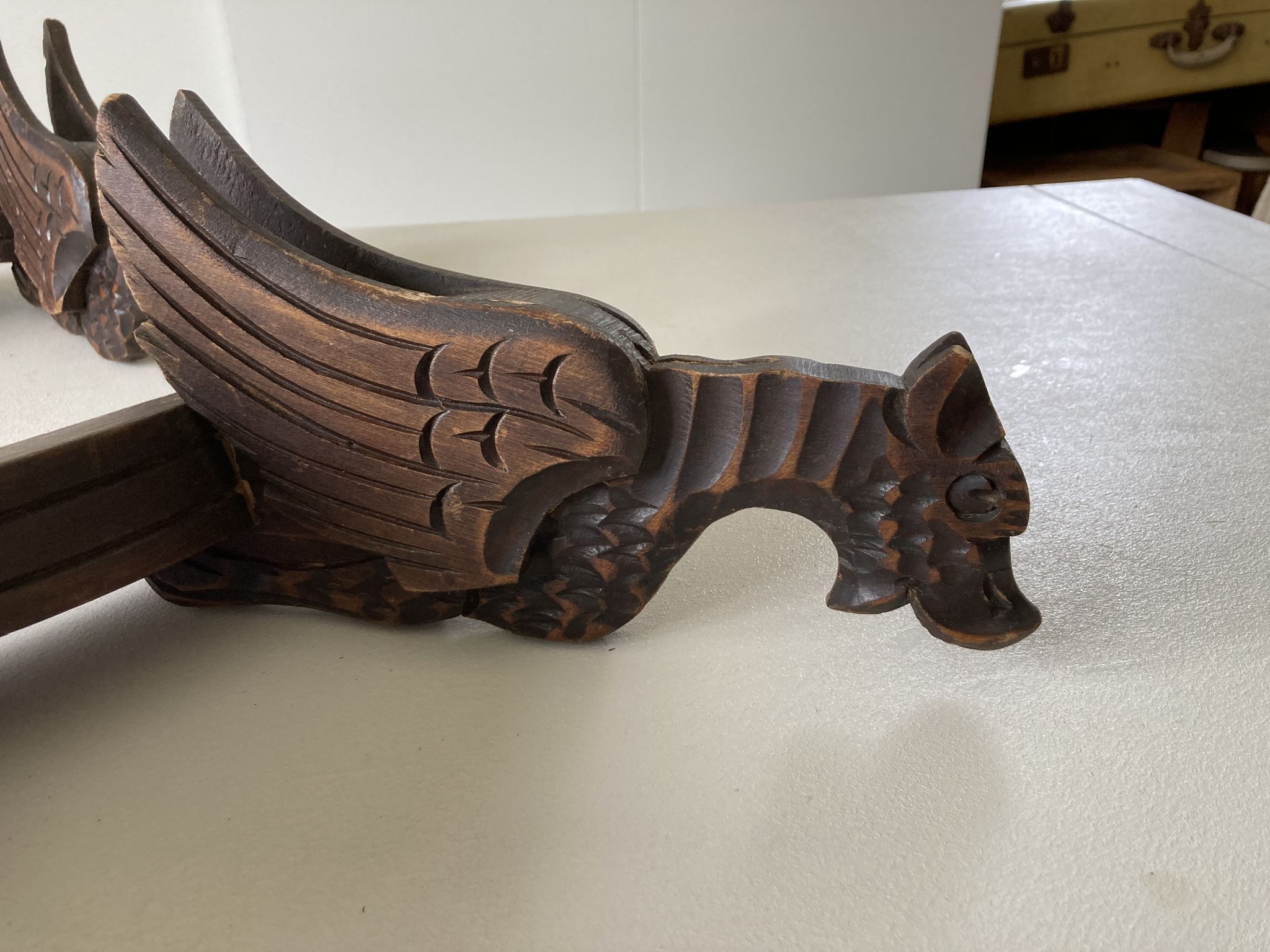 Pair of winged dragon sconces in carved wood