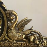 Napoleon III mirror with a pediment featuring black and gold dragons and birds.