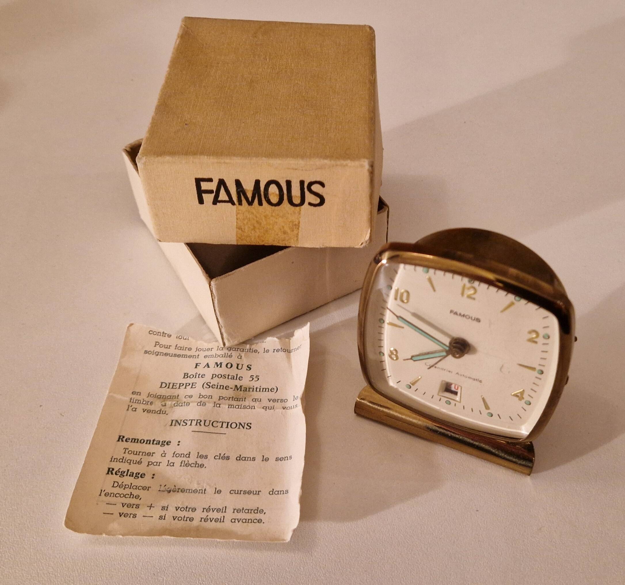 "Famous" alarm clock, automatic calendar model, vintage circa 1950, perfect condition