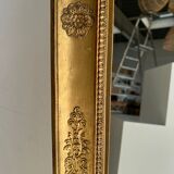 Golden mirror style Restoration decorated with stretched palmettes