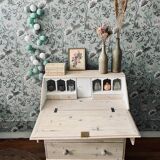 English chest of drawers topped with a sloping secretary