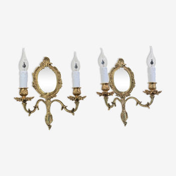 Pair of louis XV beveled mirror wall lamps in bronze by "Lucien Gau"