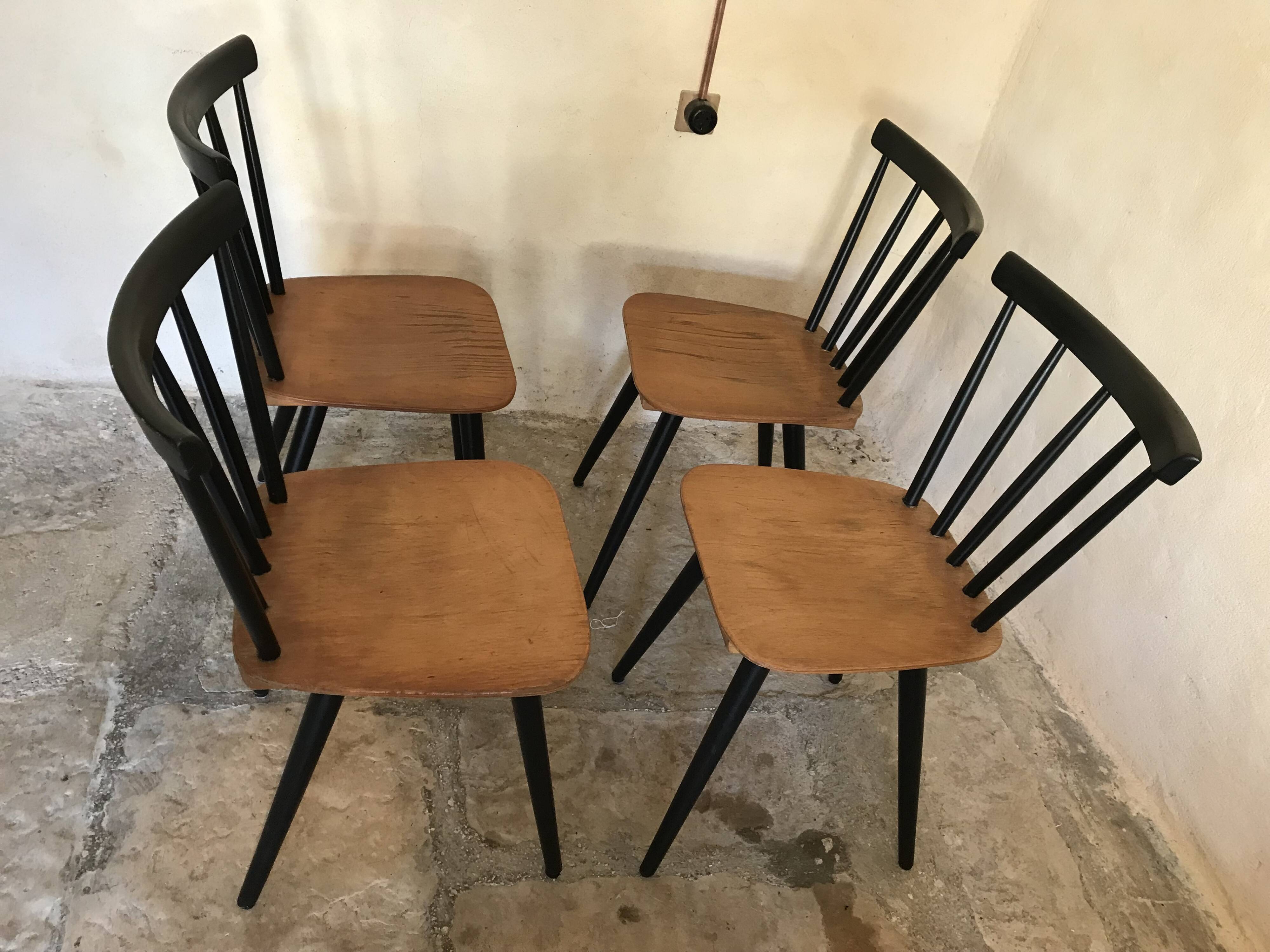 Set of 4 vintage 1960's chairs with bars and black compass legs
