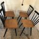 Set of 4 vintage 1960's chairs with bars and black compass legs