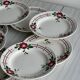 Set of 8 old earthenware plates