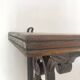 antique oak wall shelf with carved brackets