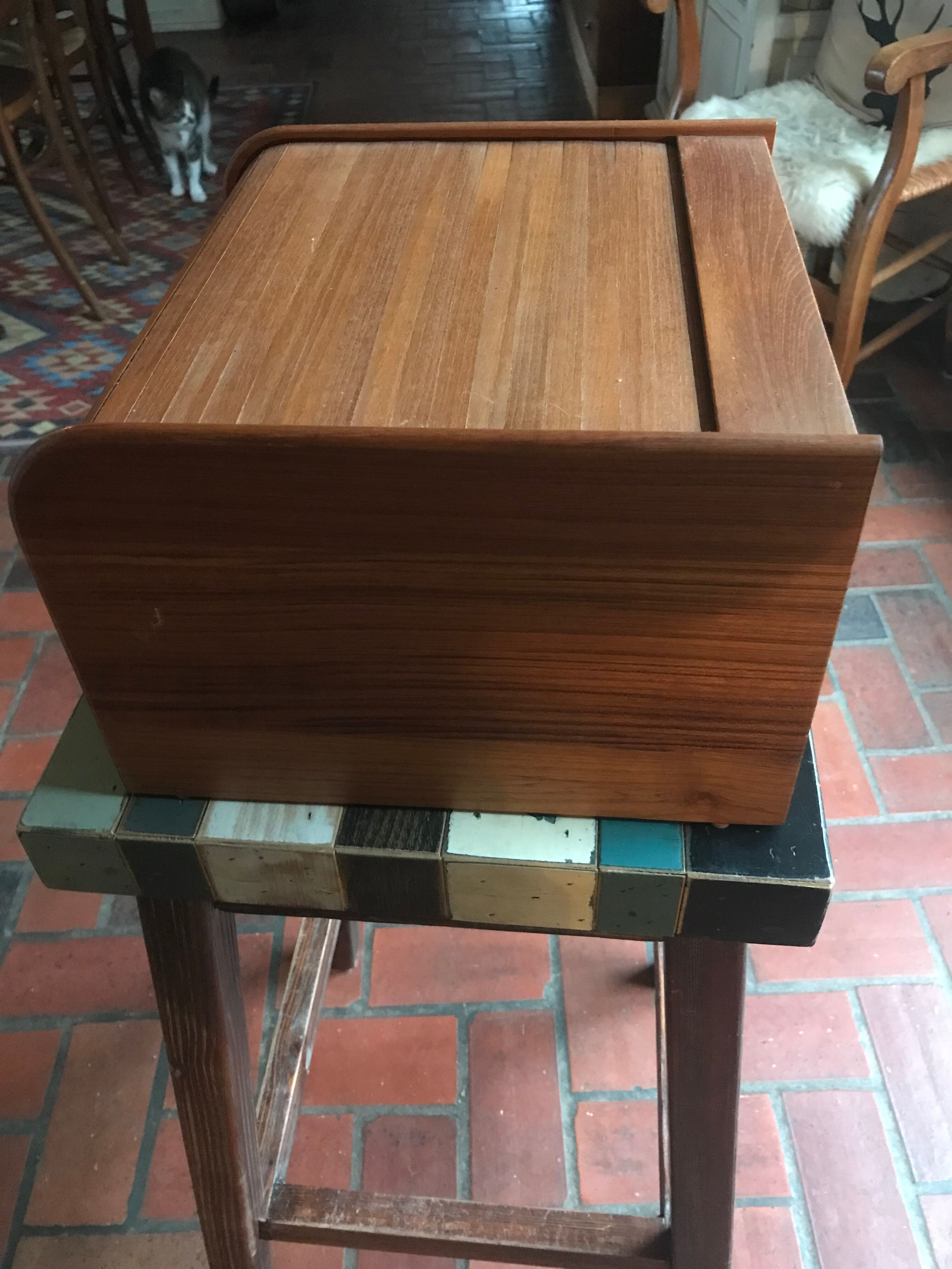 Teak box with curtain door