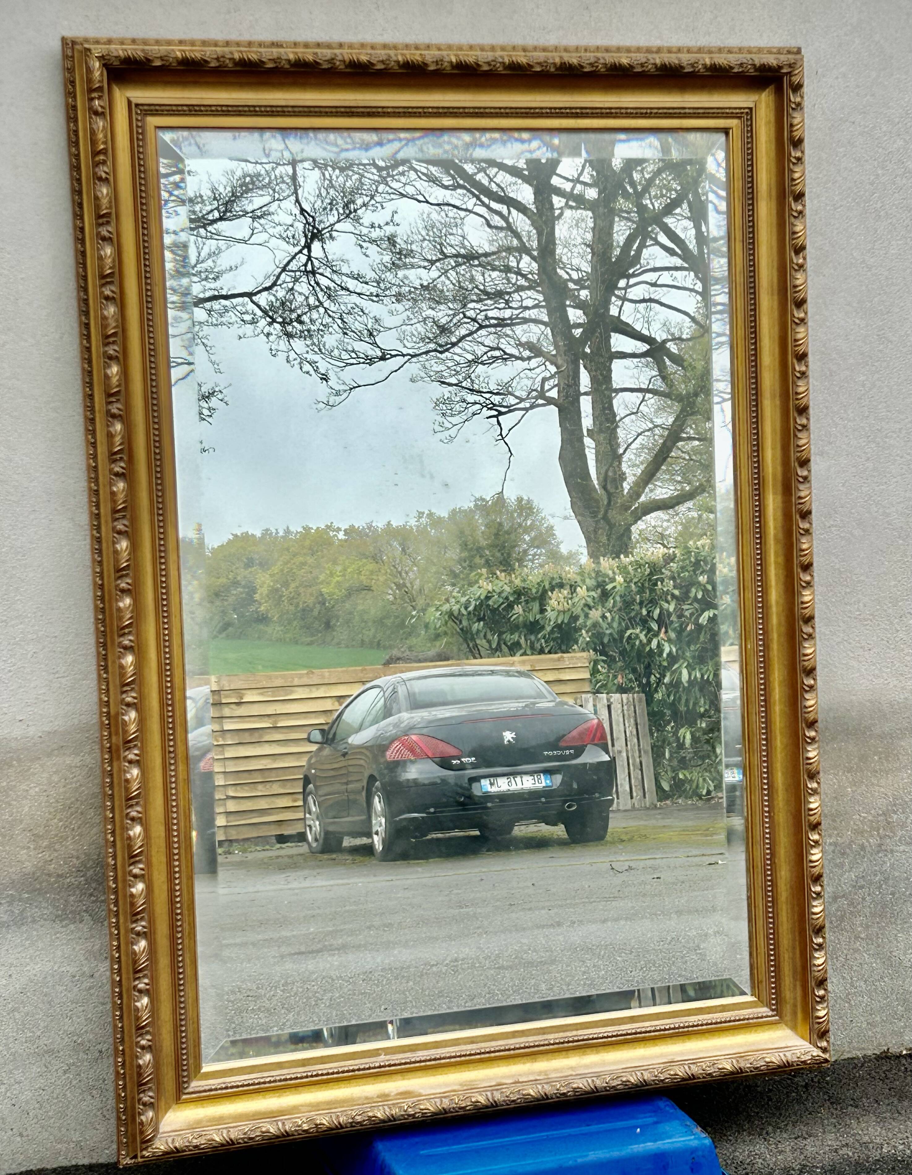 Large bevelled mirror, wood and gilded stucco, Louis XVI style - 140 x 100 cm