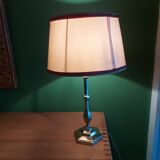 Silver metal lamp with its lampshade