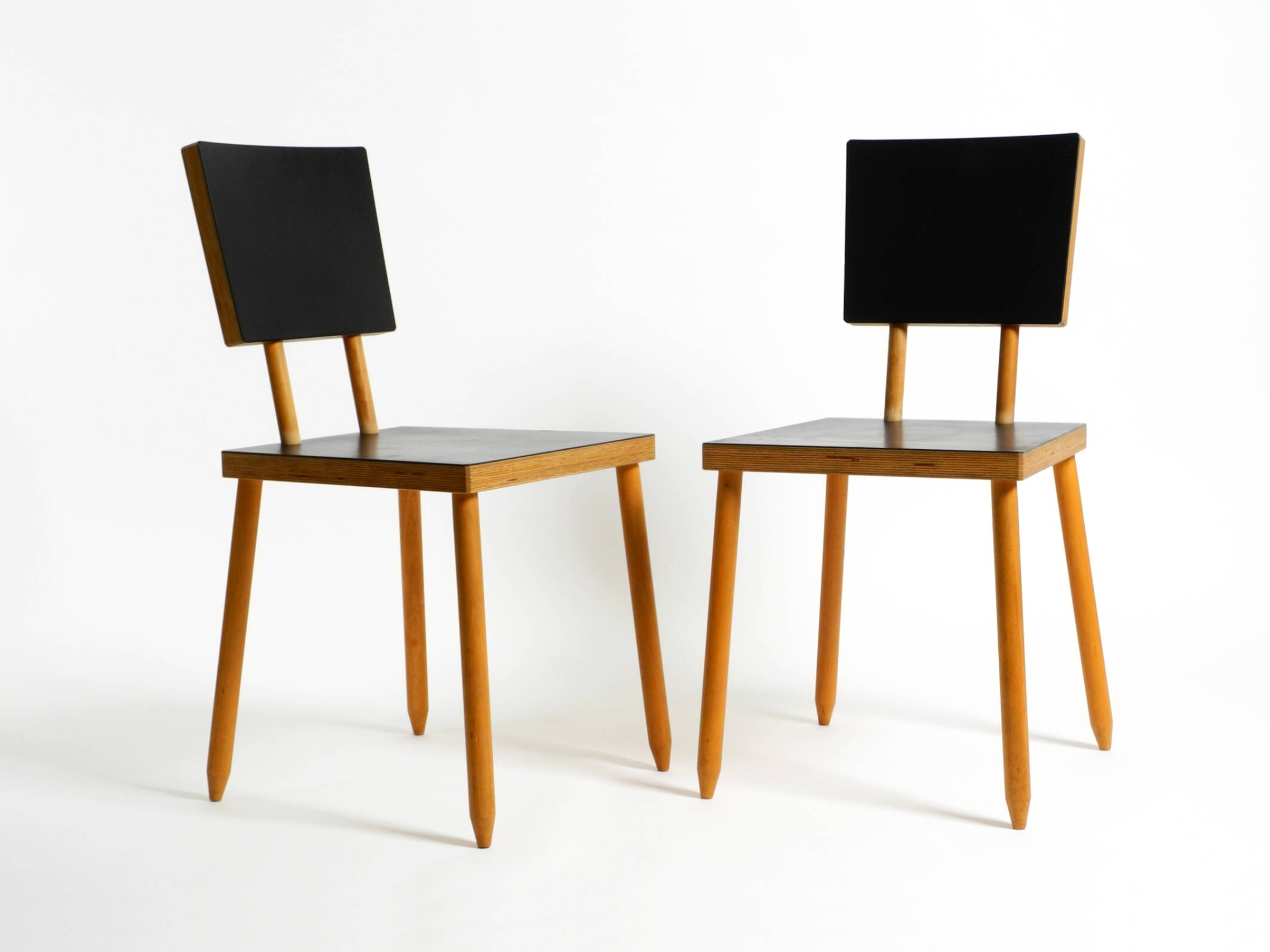 Two rare demountable plywood chairs by Axel Kufus model Stöcke for Atoll