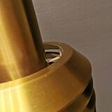 Hanging lamp in gold-colored aluminum with many layers of shades.