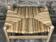 Tabouret paillé en teck brut