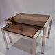 Vintage nesting tables from the 1970s, chrome and smoked glass, mid-century modern.