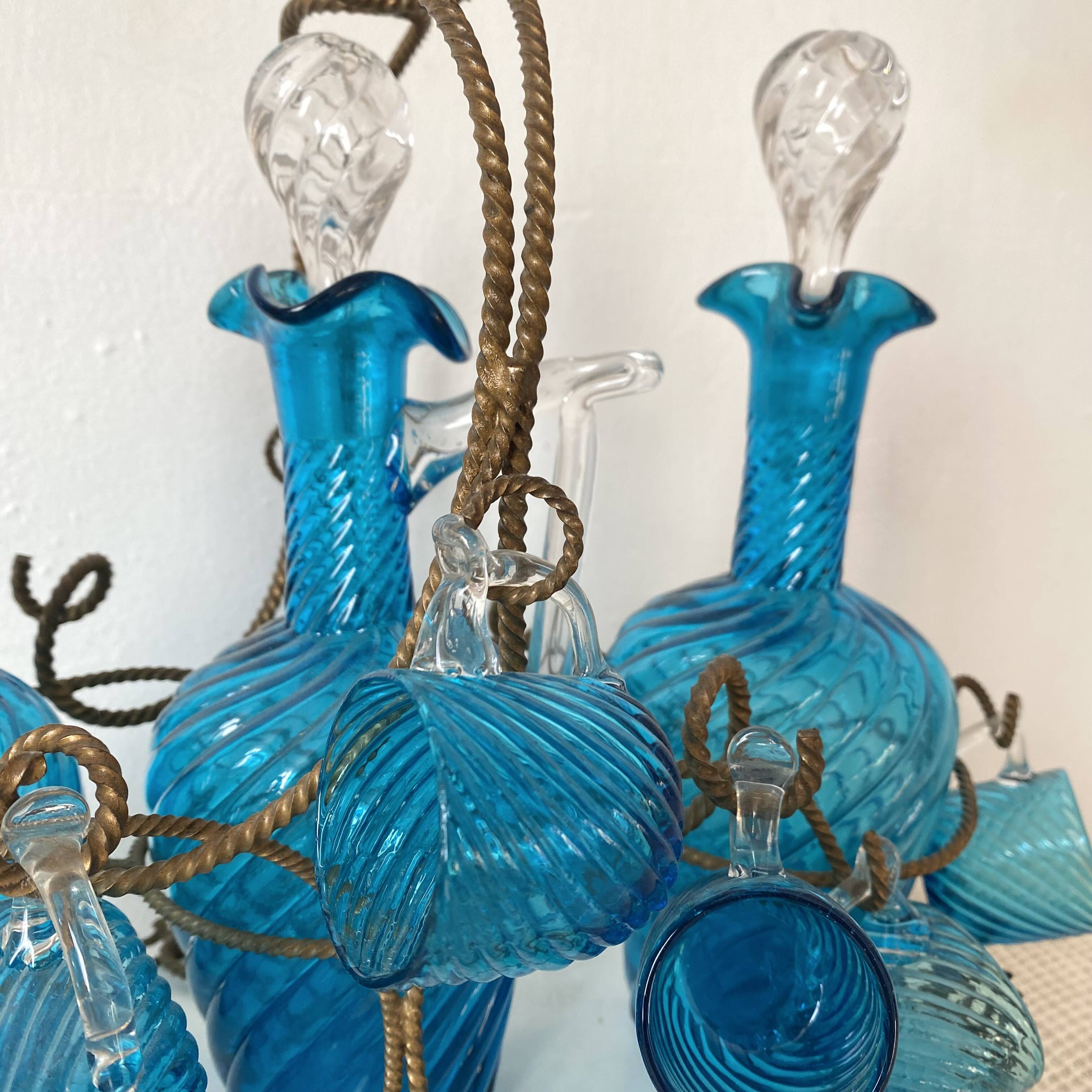 Antique Legras liquor cabinet, decanters and glasses, lion's paw stand