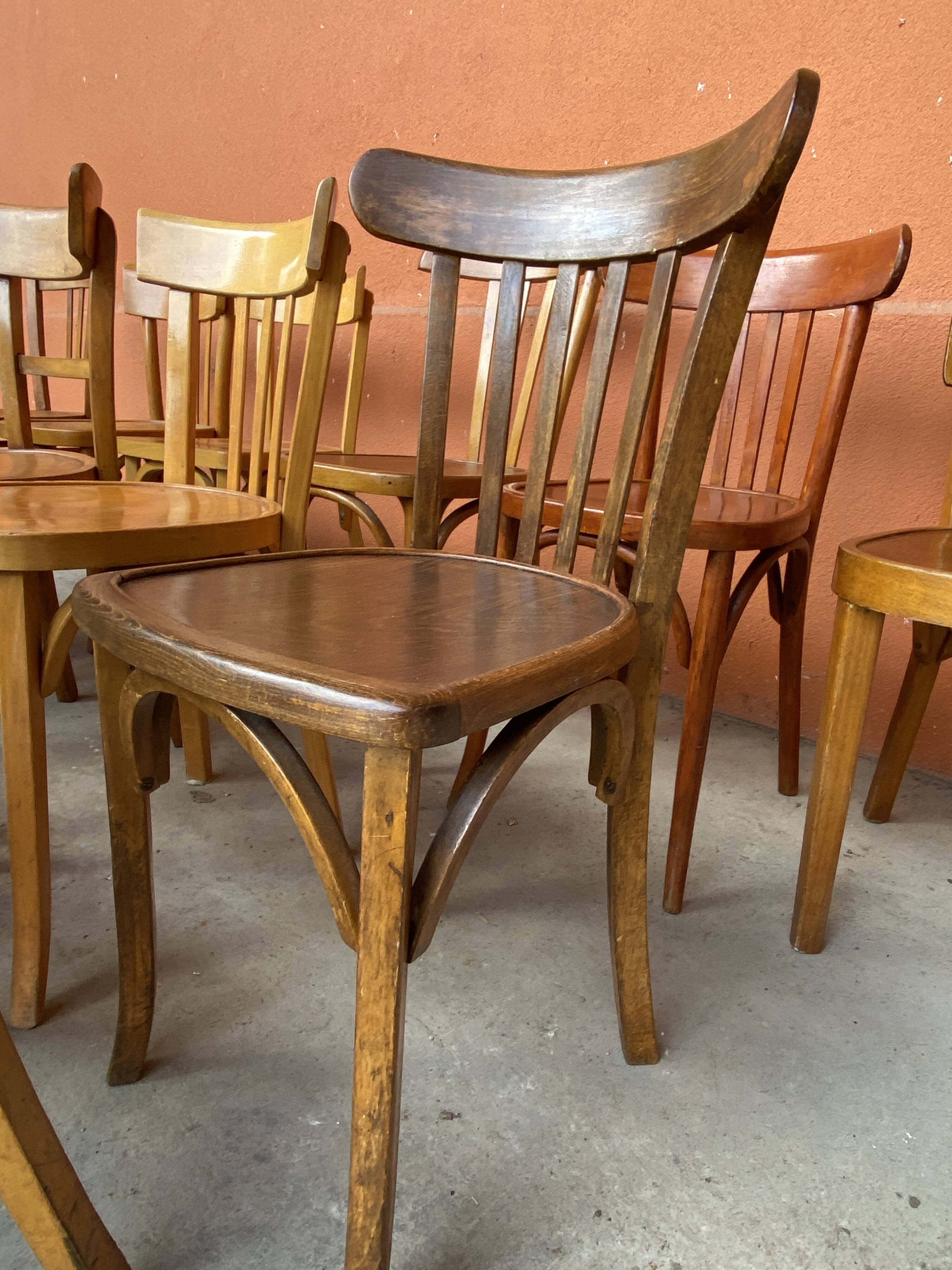 Lot of 20 mismatched Thonet Fischel restaurant bistro chairs in curved wood