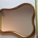 Vintage baroque style mirror, with curved frame in stucco and gilded wood 57 cm