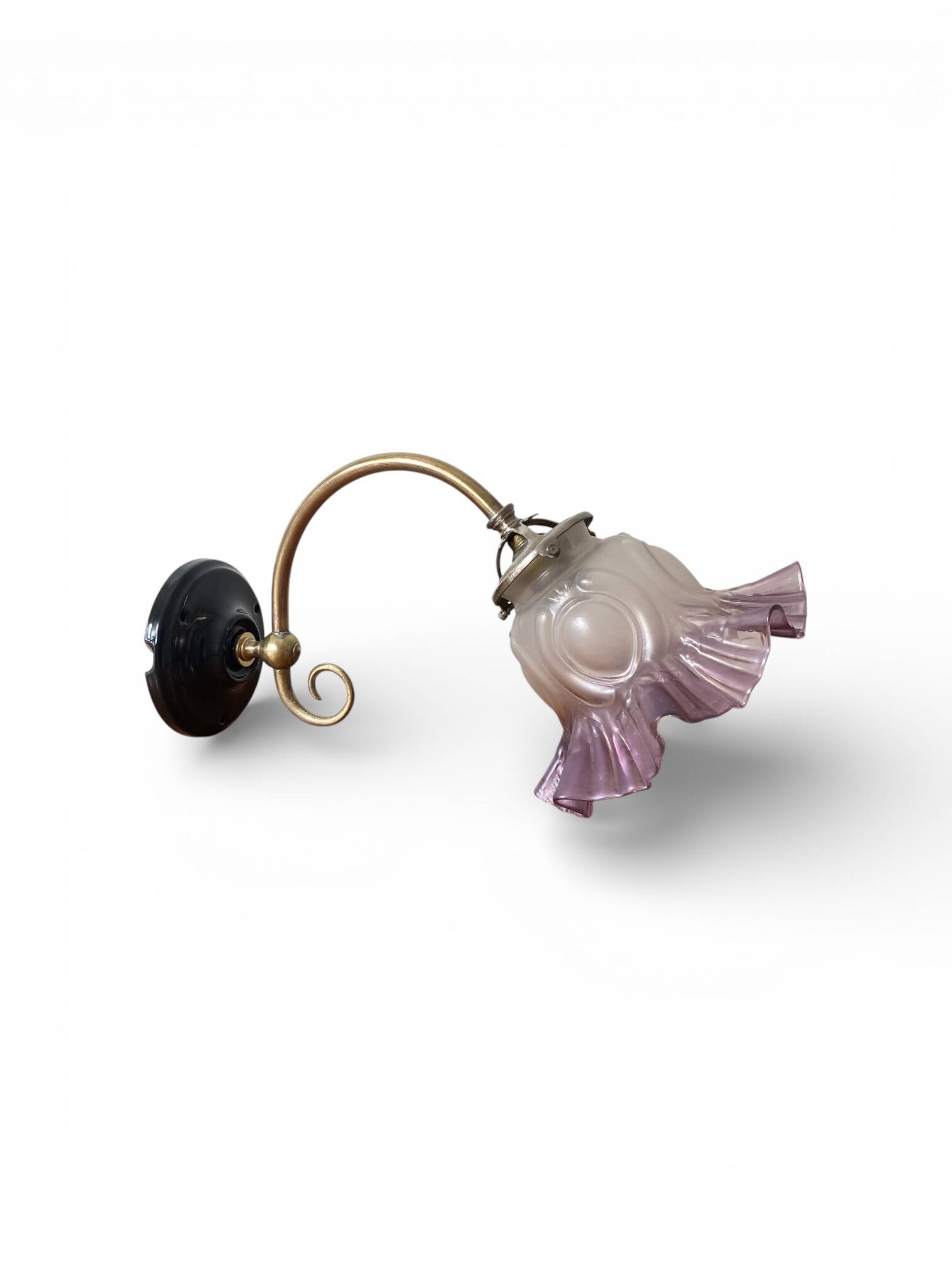 Swan neck wall light in brass with glass tulip.