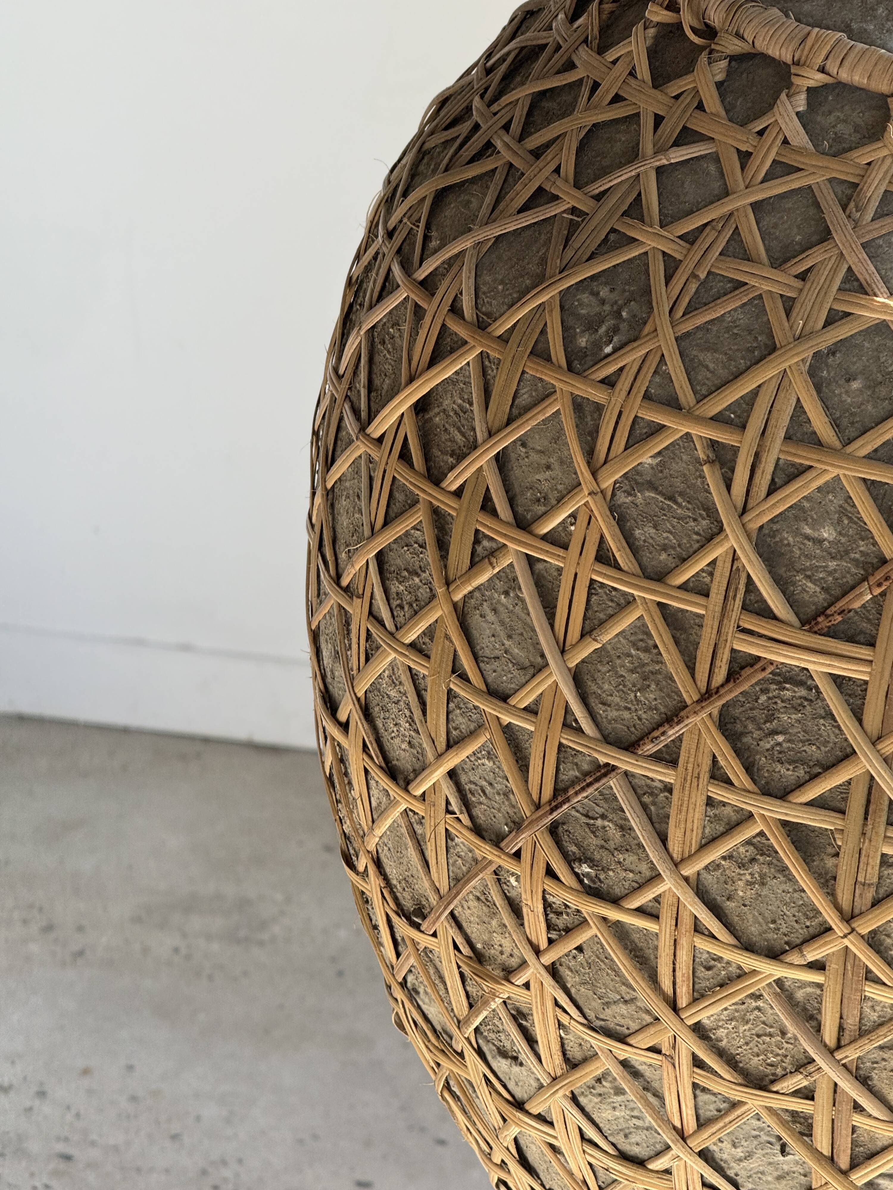 Immense light grey antique-style pot with a crosshatch lid and handles.